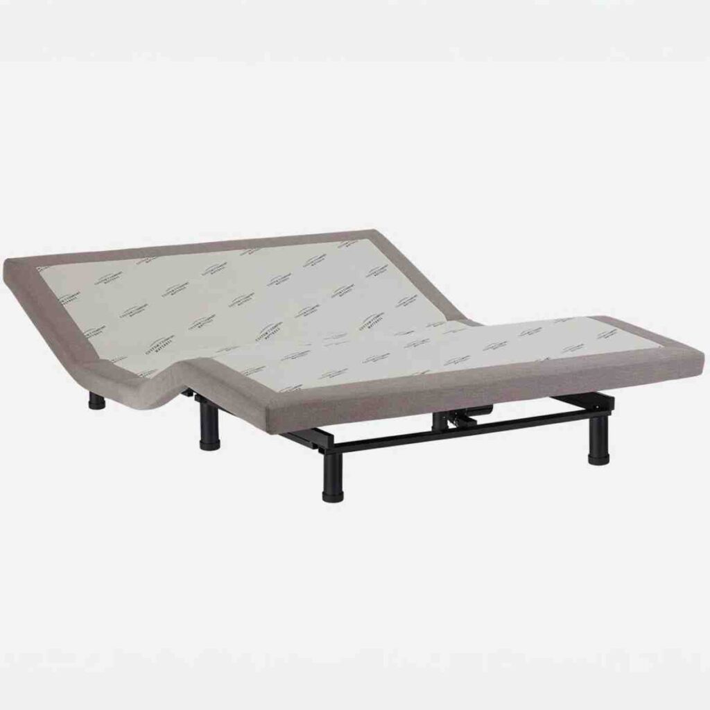 An Airpedic adjustable power base in a raised head and foot position against a white studio background.