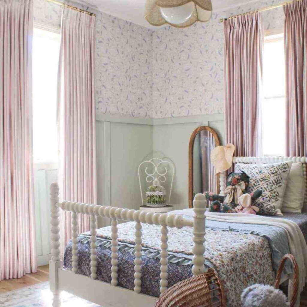 Soft rose pink blackout curtains for a kids' room with white bed linens and decor.