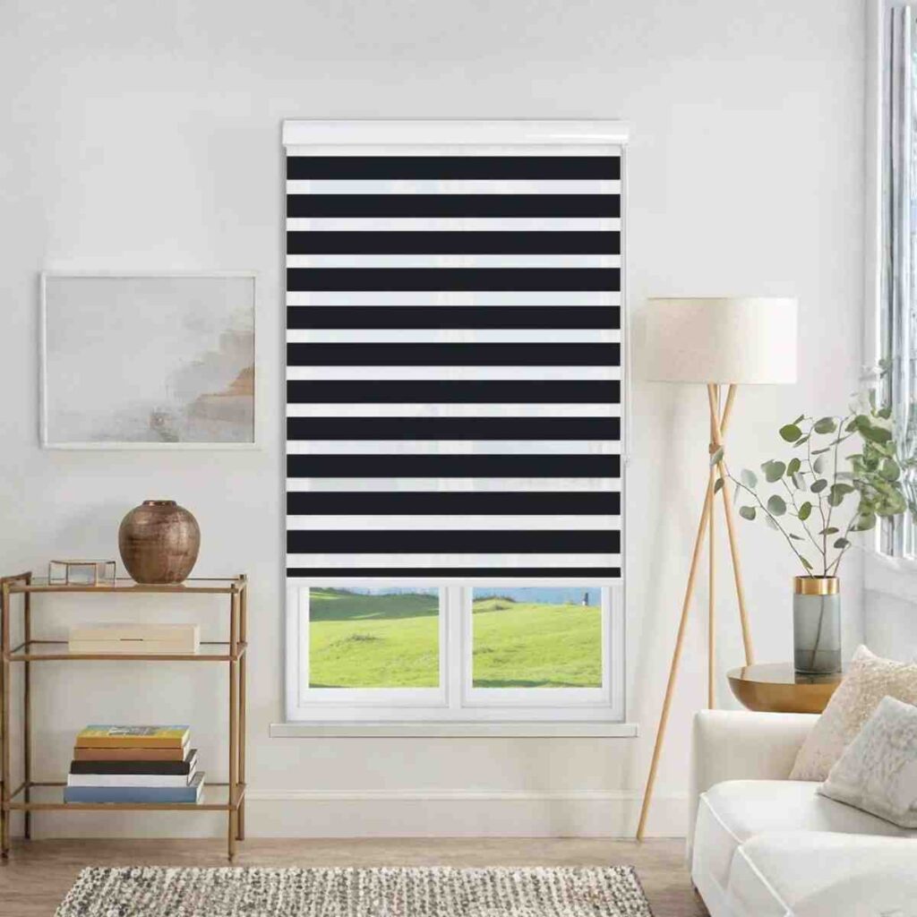 Joydeco modern black and white zebra-style dual shade for light filtering in a bedroom.
