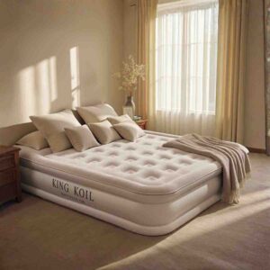 King Koil beige raised air mattress, throw and pillows in a cozy bedroom.