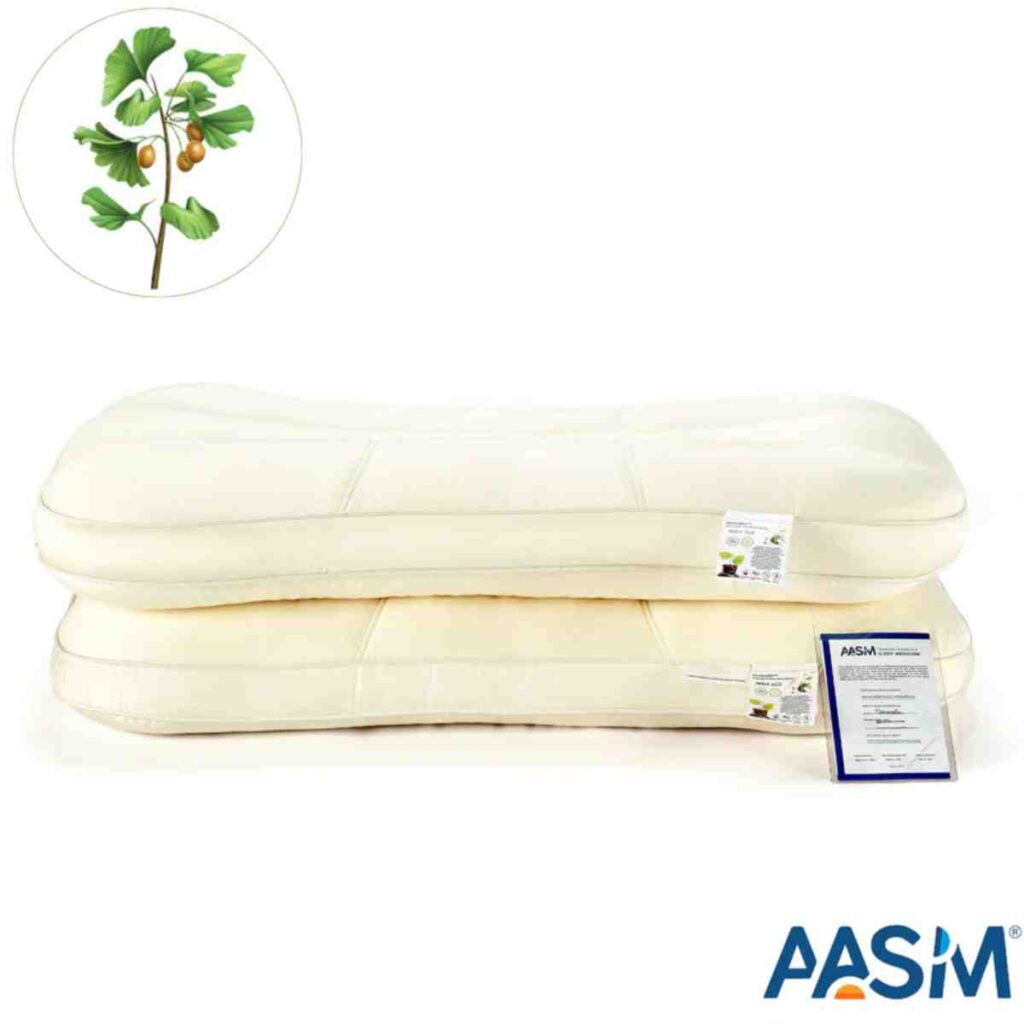 A stack of two white Promeed pillows with silk covers and AASM logo.