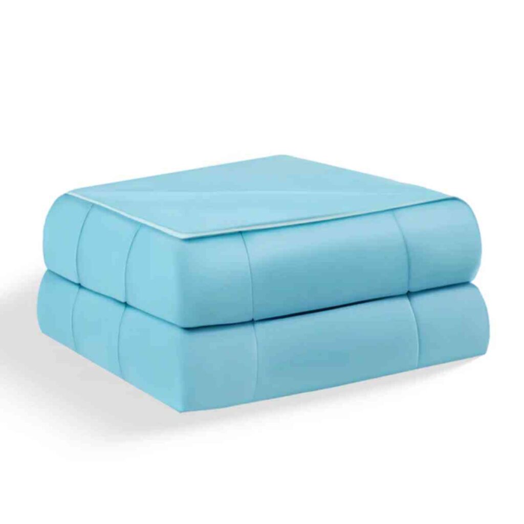 A premium cool blue Promeed silk quilt draped over a bed, featuring a smooth, lustrous texture that creates an inviting and restful sleep sanctuary.