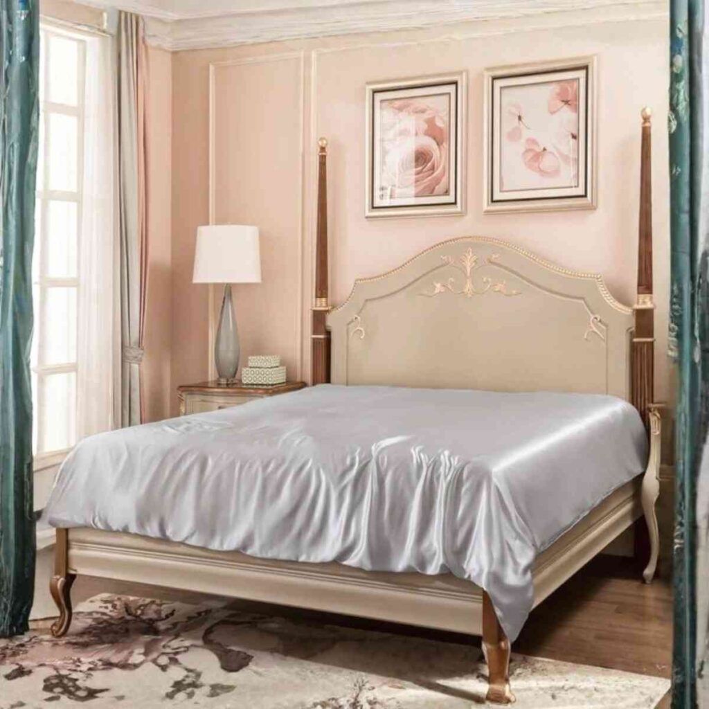 Modern minimalist bedroom featuring Promeed soft silver silk bed sheets, highlighting the lustrous and smooth fabric quality.