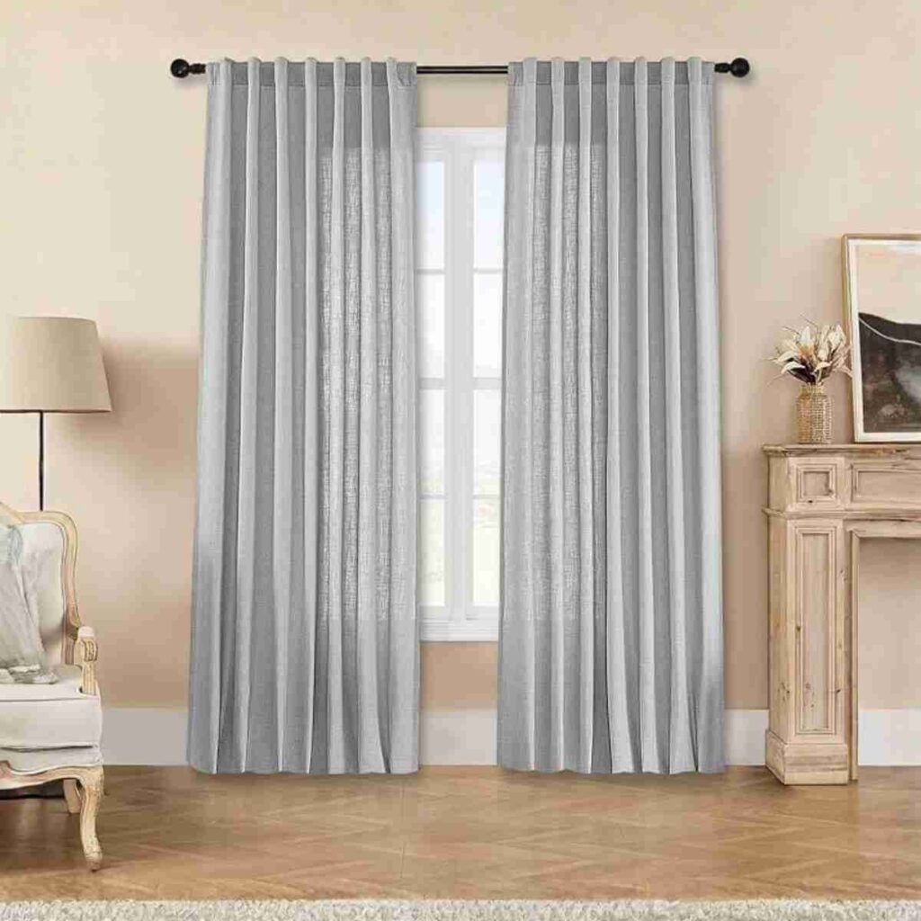Buy Joydeco Ebony Grey Linen Curtains Joydeco Ebony Grey custom linen light filtering curtain in a modern living room.