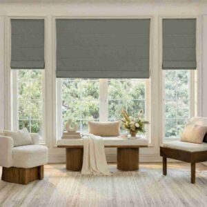 Grey Alder Roman shade featuring Joydeco’s faux linen blackout fabric in a modern living room."