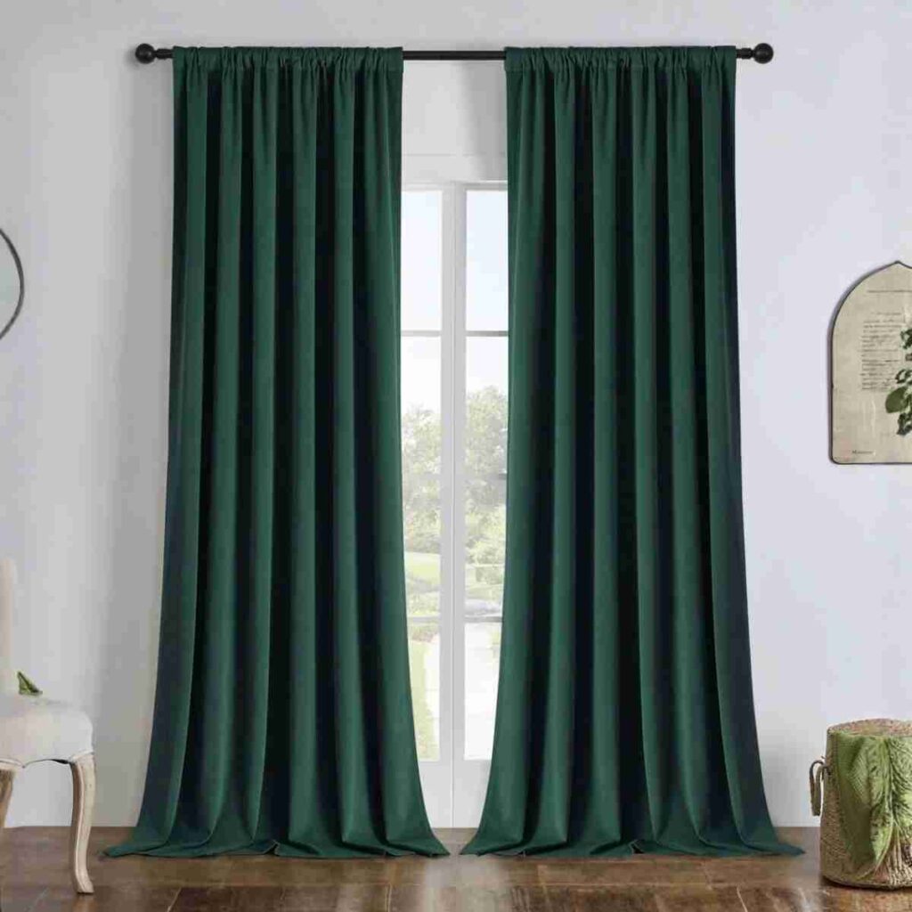 Order Joydeco Hunter Green Blackout Velvet Joydeco Hunter Green custom velvet blackout curtain with back tab detail.