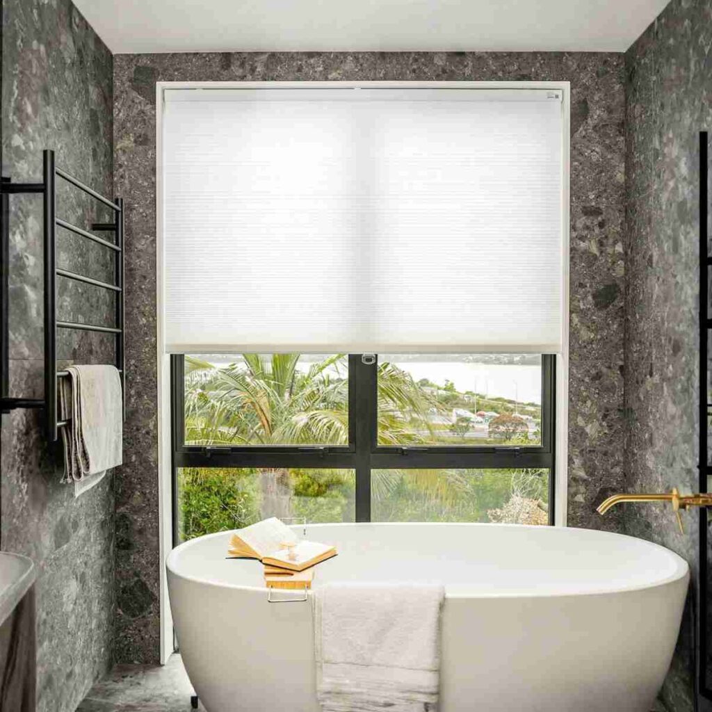 Order White Solace Cellular Shades White Solace Joydeco light filtering cellular honeycomb shade in a bathroom.