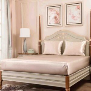 Promeed champagne gold 30 momme silk fitted sheet on elegant bed frame