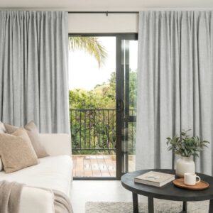 Sleek architectural window setup featuring a functional alder bleached curtain keeping glare entirely outside the room.