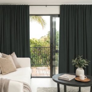A modern home window layout displaying a high-quality alder charcoal grey curtain drawing together beautifully.