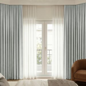 Joydeco tailored interior window treatment displaying a custom blackout curtain cigarette ash setup over a contemporary layout.
