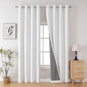 A peaceful master suite residential bedroom layout featuring premium white back tab curtains hung clean by a sunny window frame.