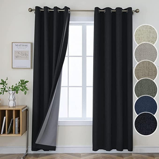 Joydeco 100% Blackout Faux Linen Textured Curtains, 2-Panel Set - Black 1 Joydeco 100% blackout faux linen curtains in blackout linen black hanging beautifully in front of a window.