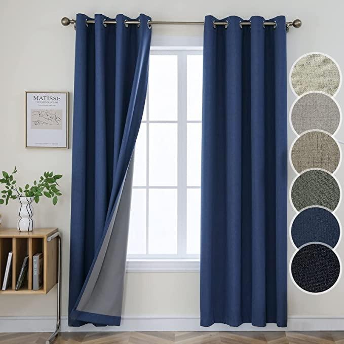Joydeco 100% Blackout Faux Linen Textured Curtains, 2-Panel Set - Navy Blue 1 Elegant textured look of Joydeco 100% sun-blocking blackout linen navy blue panels for a luxurious bedroom.