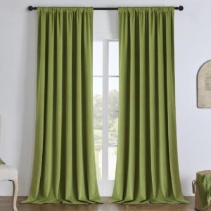 Close-up fabric details highlighting a high-quality set of olive green velvet curtains olive green draped in a modern bedroom.