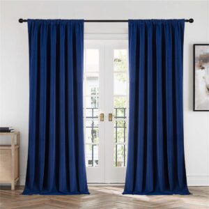 Polished farmhouse layout showing how premium navy blue velvet curtains gracefully filter daylight into a reading nook.