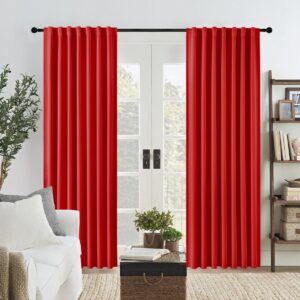 Sleek residential window frame showing how an integrated pair of blackout curtains red blocks street glare perfectly.