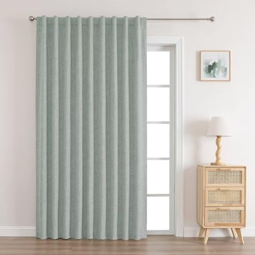 Joydeco Blackout Curtains for Living Room Bedroom French Door Curtains - Sage Green 1 A modern well-lit home interior showing functional sage green door curtains mounted clean over a residential glass window frame.
