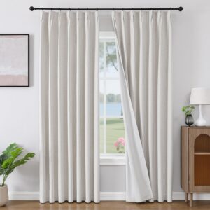 Close-up macro shot accenting the rich textile texture and precise tailoring details of a durable ivory linen blackout curtains.