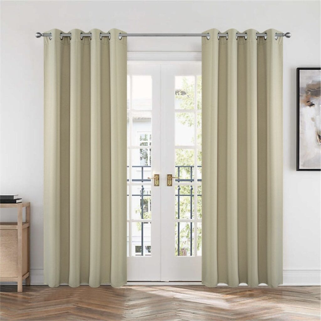Window Treatments 40 A bright living room space displaying elegant thermal panel curtains beige hanging beautifully by a modern window layout.