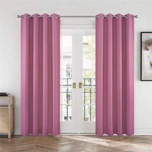 Sleek architectural living zone highlighting how a high-quality set of light pink thermal curtains offers complete glare protection.