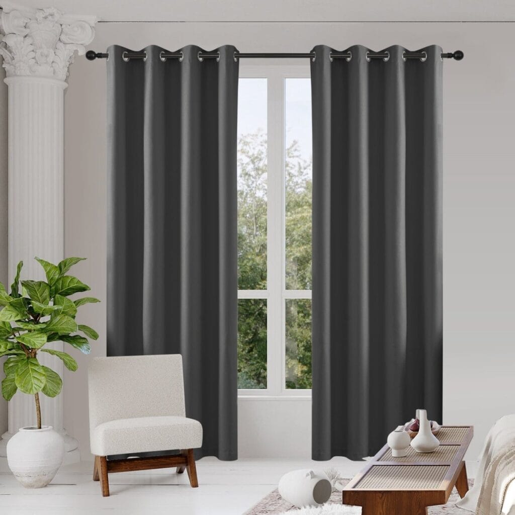 Joydeco heavy-duty fabric window treatment presenting elegant long blackout curtains grey styling in a modern space.