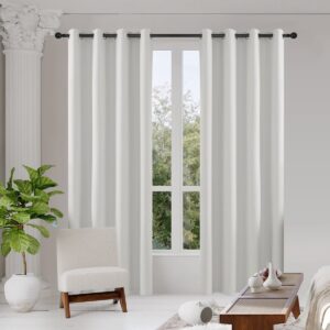 Close-up macro display highlighting the soft touch texture and precise hem of a clean long blackout curtains ivory set.