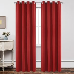 Stylish joydeco blackout red sun-blocking drapes hanging gracefully next to a decorated side table.