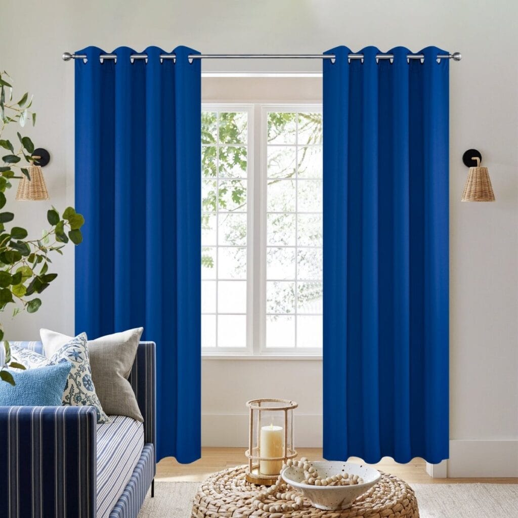 Elegant joydeco blackout royal blue window drapery set featuring premium soundproof and thermal insulation.