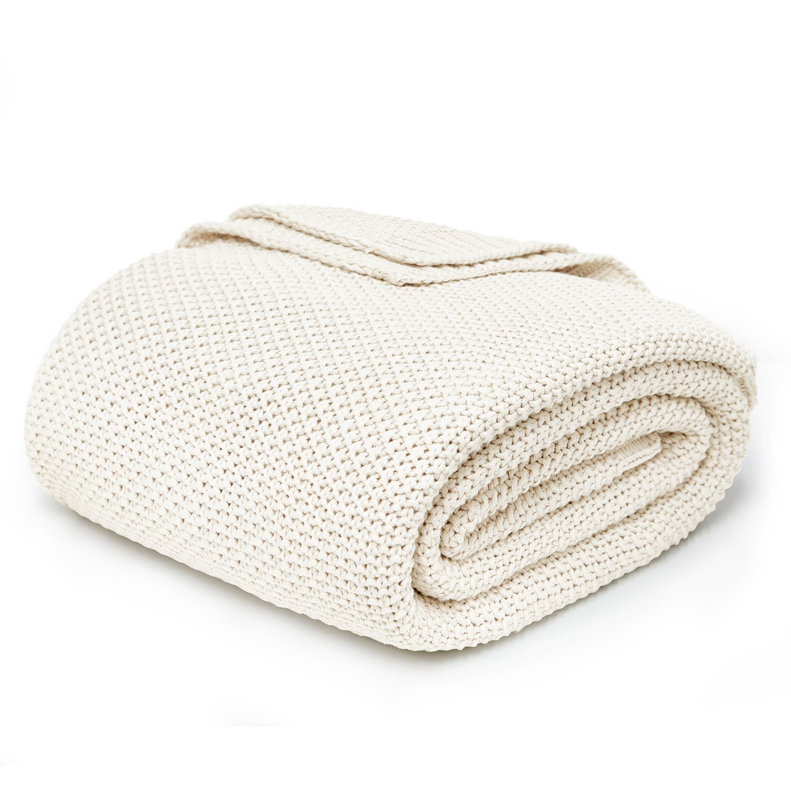 Joydeco Chunky Cable Knit 100% Cotton Cozy Twin Throw Blanket - Cream White 1 Joydeco soft textiles showcase featuring a premium quality cozy knit blanket cream white loosely folded over a contemporary sofa frame.