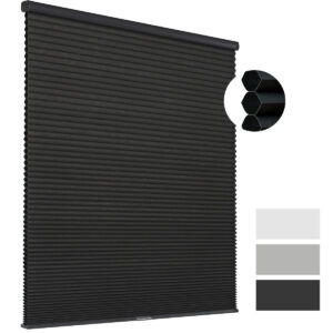 Sleek architectural setup showcasing how a set of functional black cellular blinds separates spaces and prevents outside drafts.