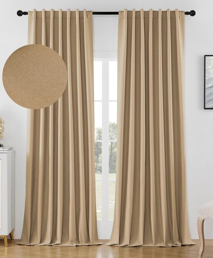 Joydeco custom home decor setup showing tailored dark beige curtains back tab framing a scenic bedroom doorway views.