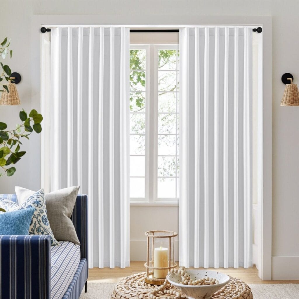 Close-up clean view showcasing the heavy fall and soft tactile grain of a custom white curtains back tab panel.