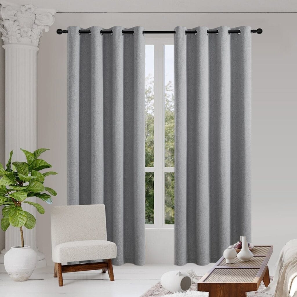 Close-up clean view showcasing the heavy fall and soft tactile grain of a custom thermal curtains light grey panel.