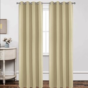 A polished residential bedroom layout featuring a beautiful blackout beige curtain drawn shut to secure total rest.