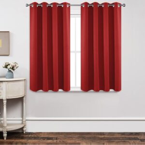 Joydeco tailored window treatment displaying an elegant blackout red curtain installed over a clean casual setting.