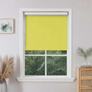 Polished contemporary floor space displaying a high-quality blackout roller shade yellow styled neatly along a hallway window.