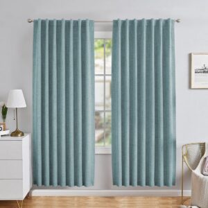 Joydeco interior decor concept highlighting full coverage hunter green back tab curtain set alongside a glass panel.