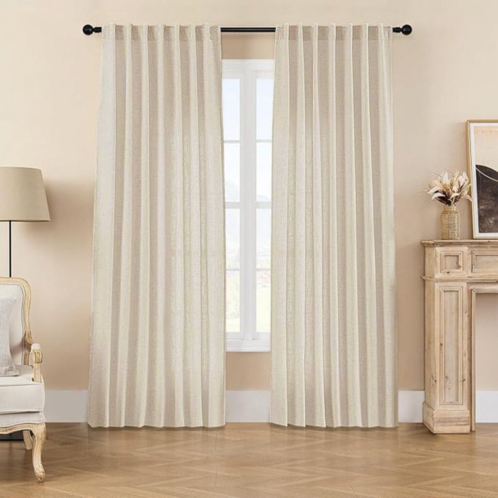 A polished residential space styled beautifully with a high-quality natural linen curtain filtering daylight.