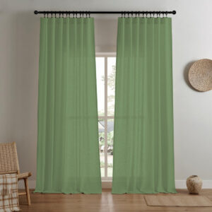 A modern home interior showing high-quality linen curtain sage green installed clean across a bright window frame.