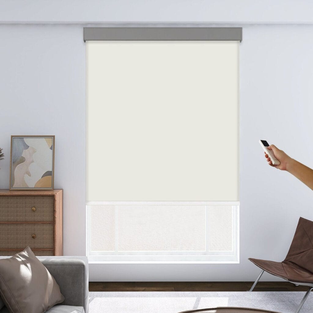 Joydeco tailored window treatment displaying an elegant motorized blackout ivory installed over a clean casual setting.