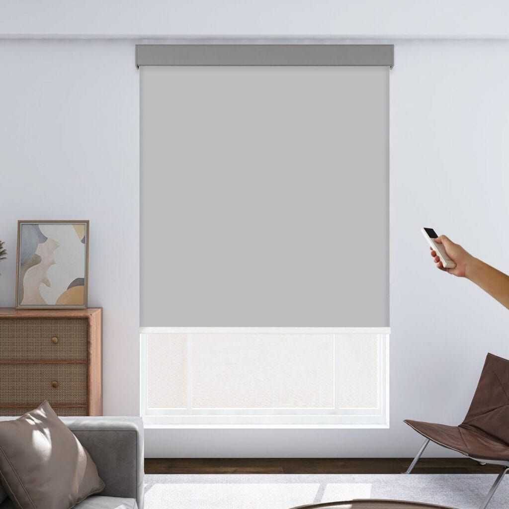 Close-up clean view focusing on the flat textile face and precise tracks of a sleek motorized blackout light gray.