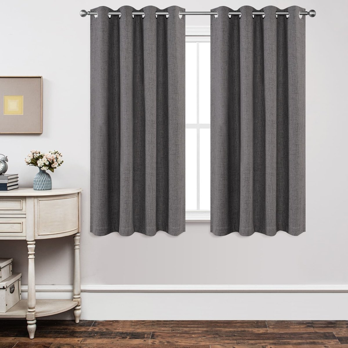 Joydeco Custom Textured Thermal Insulated Blackout Curtain - Grey 1 A bright living space window adorned with a gorgeous grey thermal blackout curtain filtering daylight beautifully.