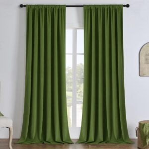 A tailored residential window layout showcasing beautiful velvet blackout forest green installed cleanly across a sunlit room.