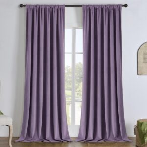 Polished contemporary floor space displaying a high-quality velvet blackout purple styled neatly along a hallway window.