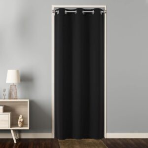 Polished farmhouse layout showing how premium extra wide black curtains gracefully filter daylight into a reading nook.