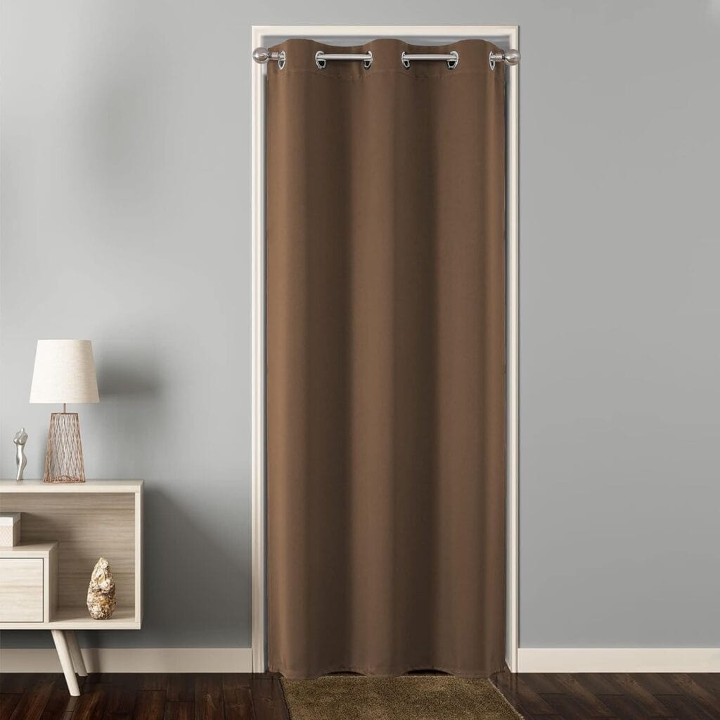 Joydeco interior decor concept highlighting full coverage extra wide brown curtains set alongside a glass panel.