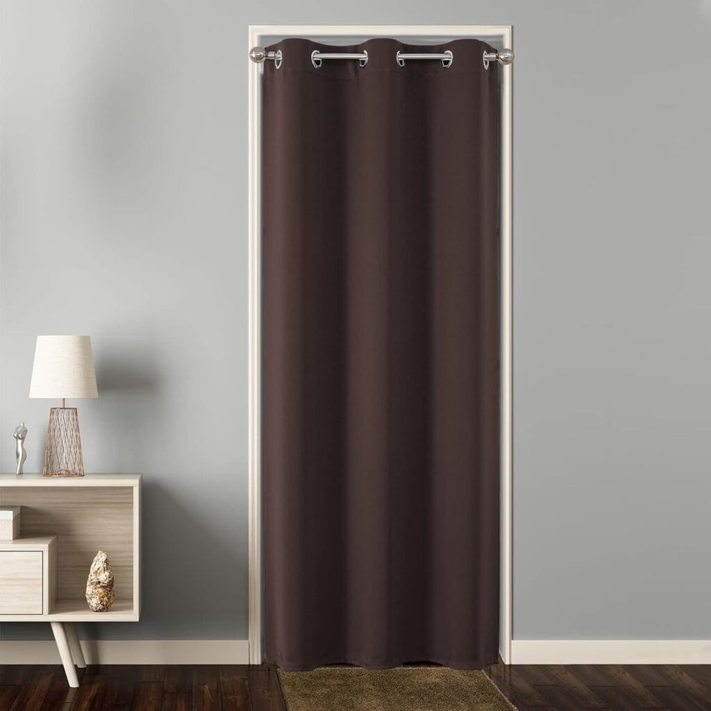 Joydeco interior decor concept highlighting full coverage extra wide chocolate curtains set alongside a glass panel.