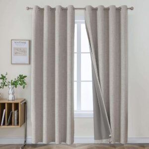 Close-up fabric details highlighting a high-quality set of greyish white linen curtains draped in a modern bedroom.