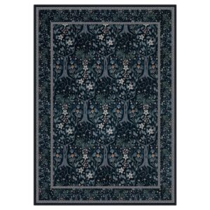 A polished residential space styled beautifully with a high-quality black blue floral runner rug filtering daylight.